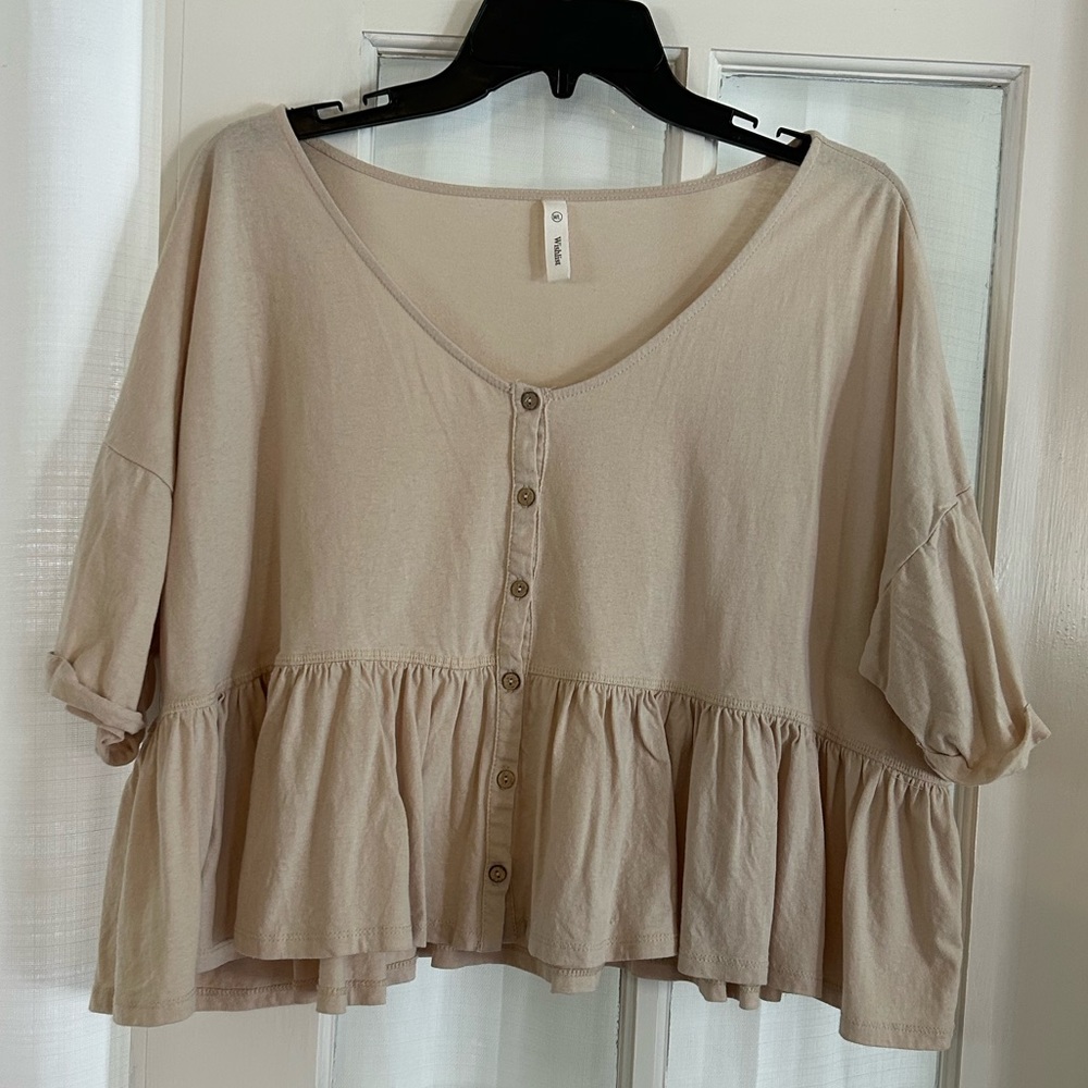 Cropped, peplum style top